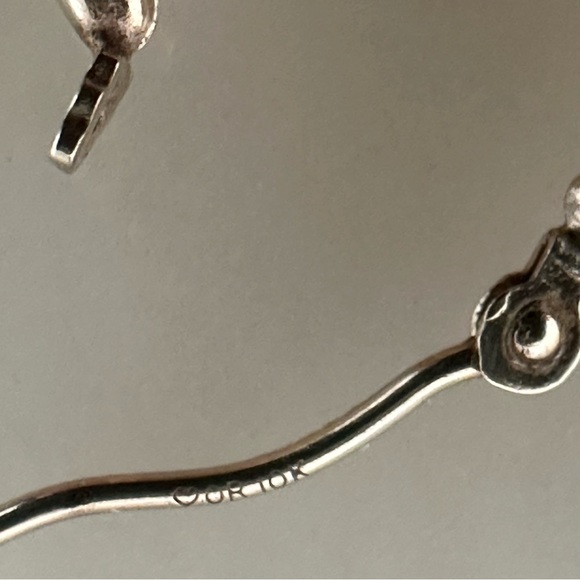 10k Solid Gold Hollowed Hammered Hoop Earrings - Picture 3 of 15